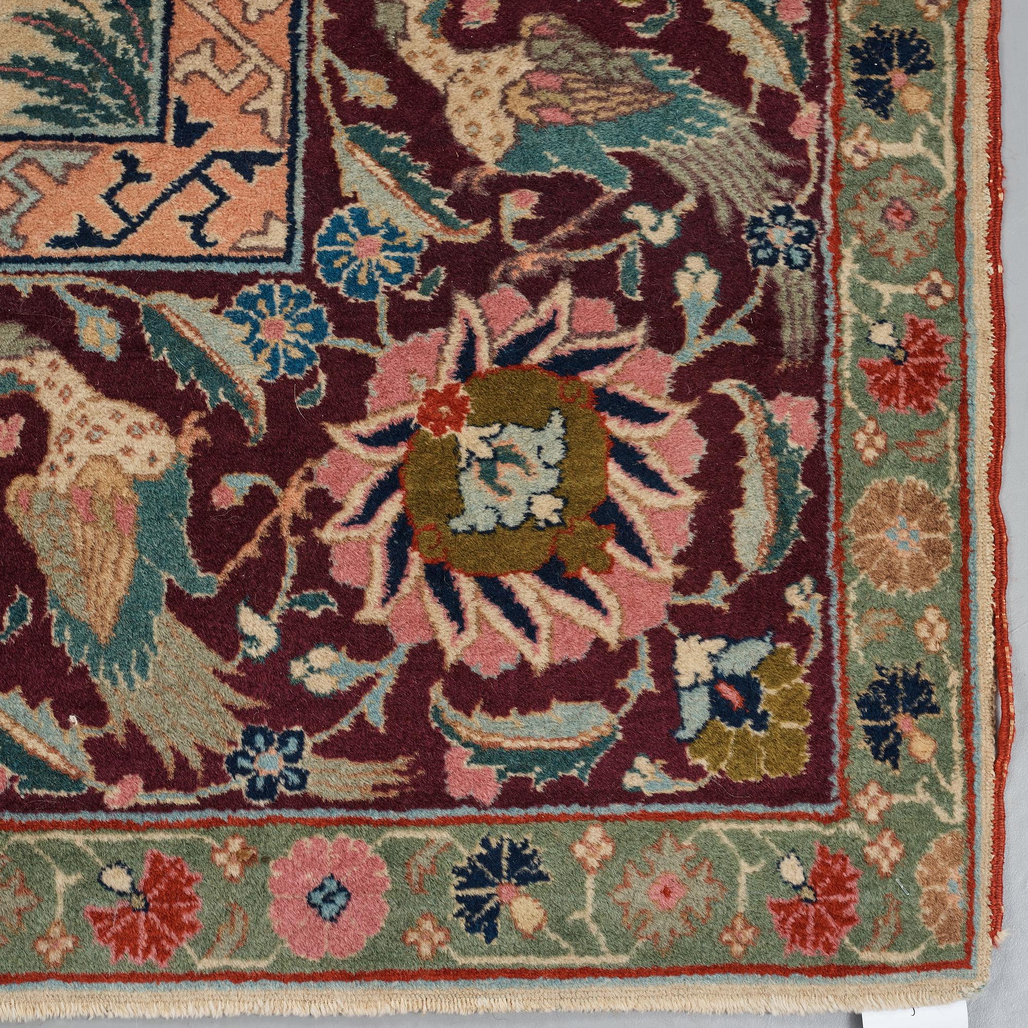 A CARPET, a semi-antique Tabriz figural, ca 327-333,5 x 236,5-240 cm.