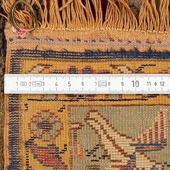 A Turkish rug c. 178 x 122 cm.
