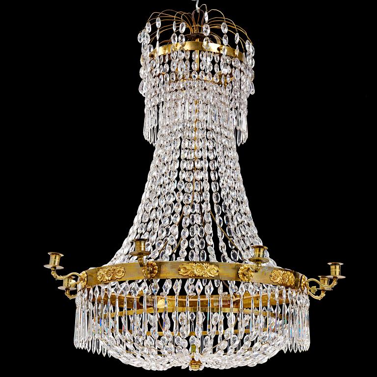 A Swedish late Empire gilt brass nine-light chandelier, 1830's.