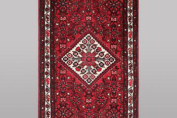 A runner carpet, Hosseinabad, ca 393 x 82 cm.