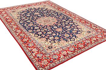 A Kashan carpet, a. 365 x 257 cm.