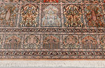 A silk Kashmir carpet, approx. 327 x 243 cm.