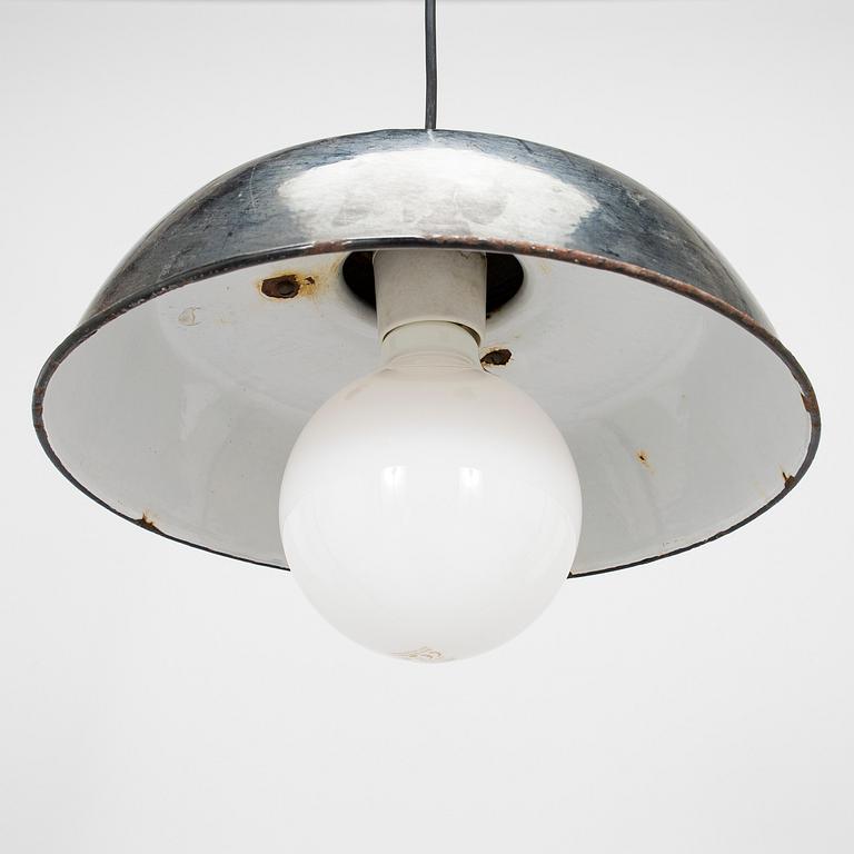 Paavo Tynell, four 1930s pendant lights / industrial lights for Taito.