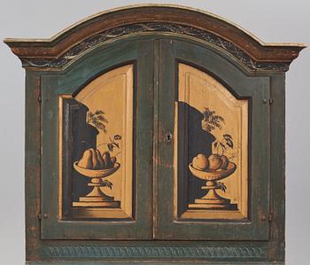 A polychrome-painted writing-cabinet attributed to J. Bäckström (1773-1837), dated 1828.