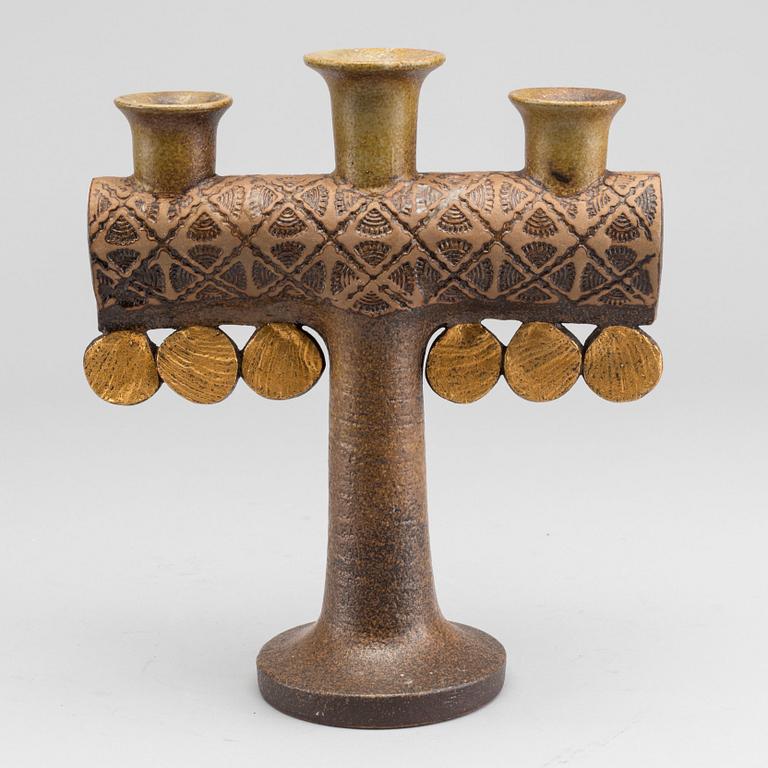 LISA LARSON, a ceramic candelabra.