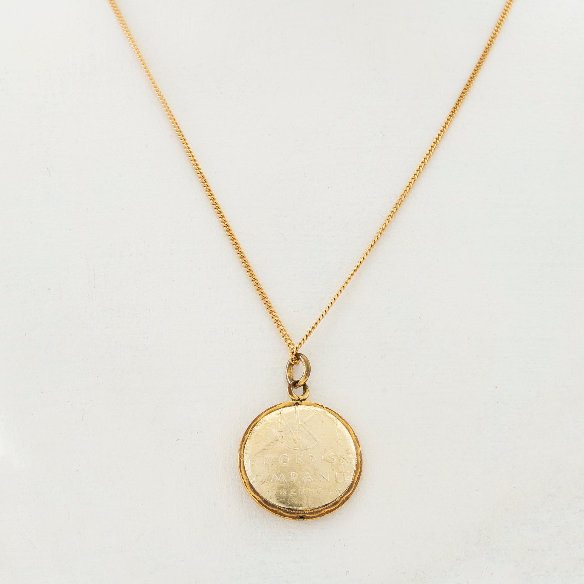 Halsband 18K guld med hänge av 8K guld.
