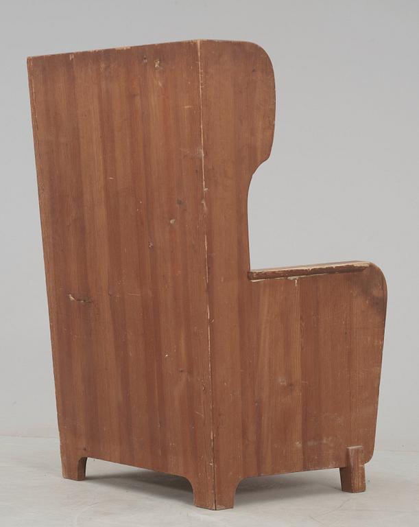 An Axel Einar Hjorth 'Lovö' stained pine armchair, Nordiska Kompaniet, Sweden 1930's.