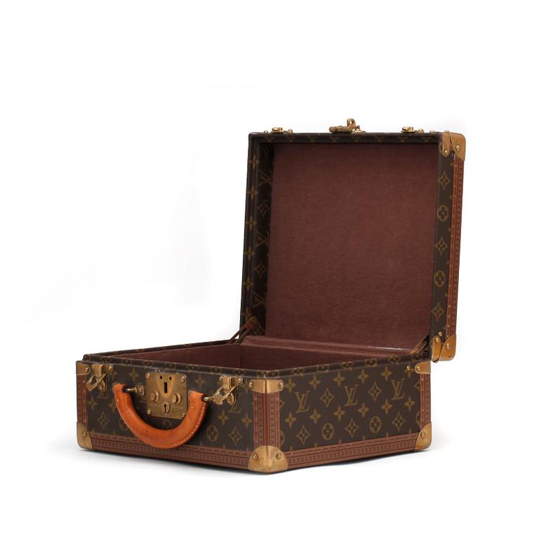 LOUIS VUITTON, a monogram canvas suitcase, "Le Loziné".