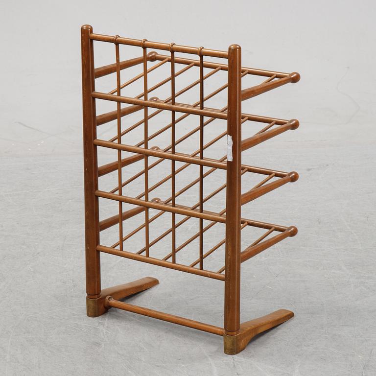 A magazine stand, mid 20th century.