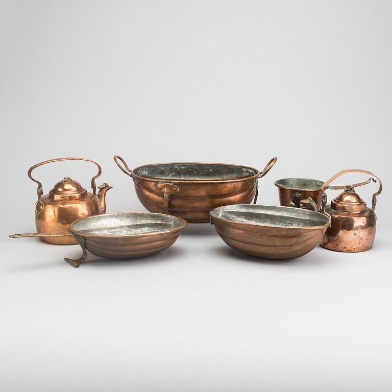 Six 19th century copper pots and pans.