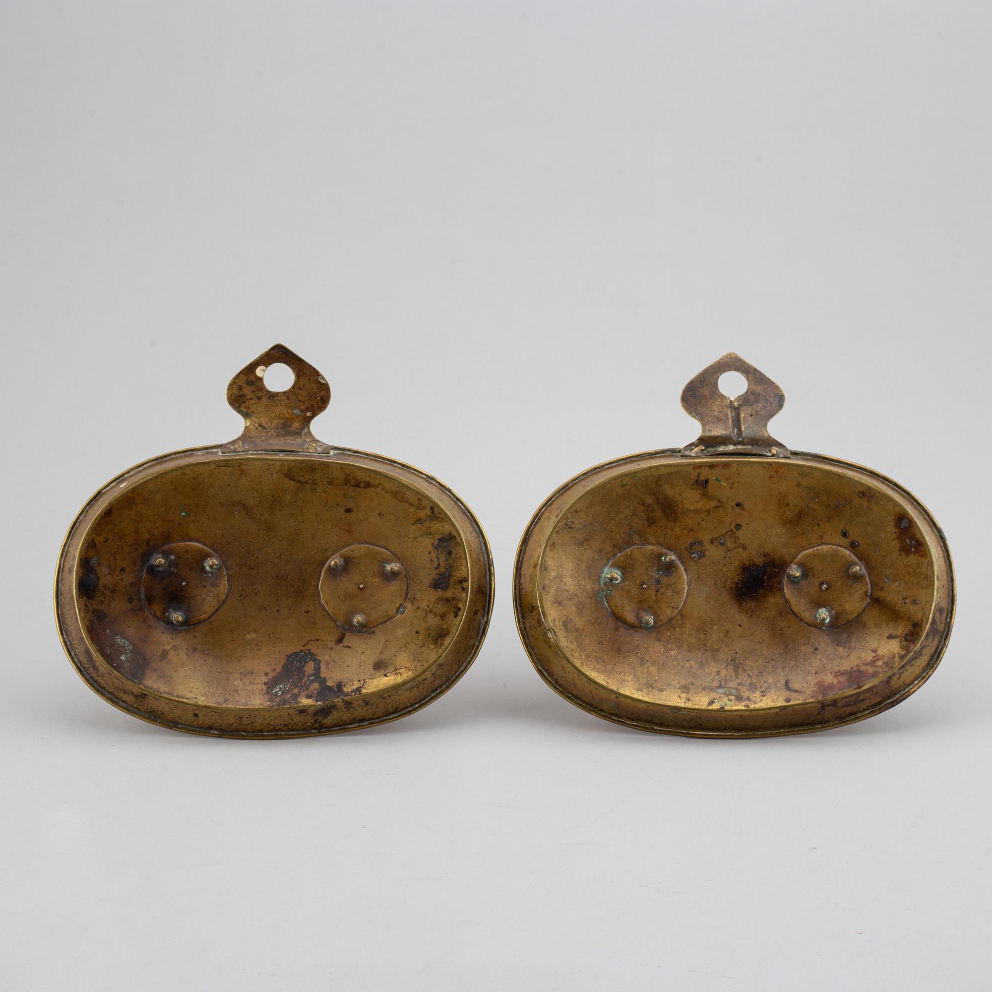 A pair of North European Brass double candelholders, 19th century.