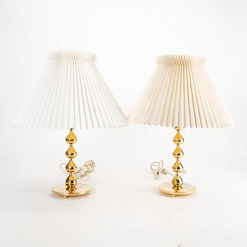 A pair of 24 carat gold plated "Teardrop" table lamps by Hugo Asmussen, Denmark, second half of the 20th century.