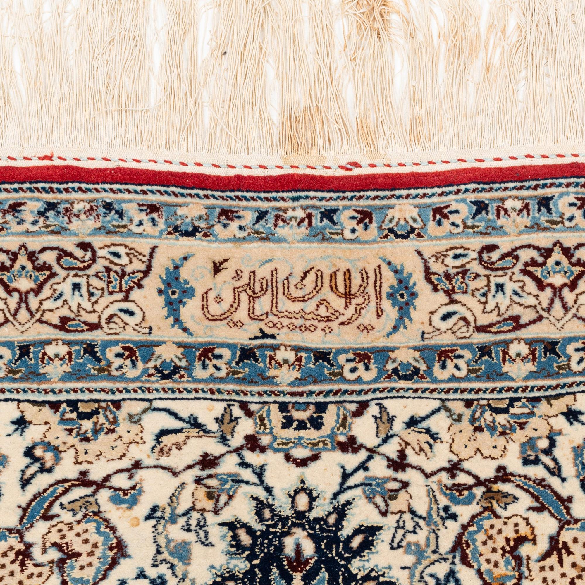 A semi-antique Nain Tusheshk, signed, ca 324 x 223 cm.