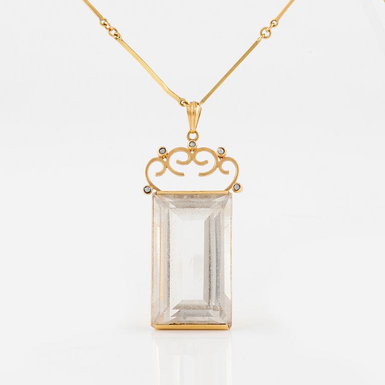 Pendant with chain, 18k gold and rock crystal, Stigbert.