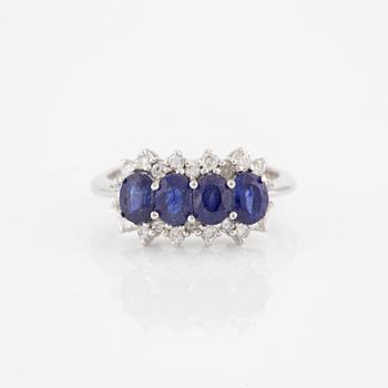 Ring, 18K white gold with sapphires and brilliant-cut diamonds.