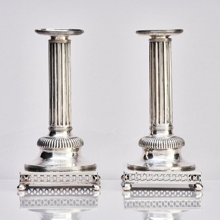 A pair of Swedish 18th century Gustavian silver candlesticks, marks of Arvid Floberg, Stockholm 1799.