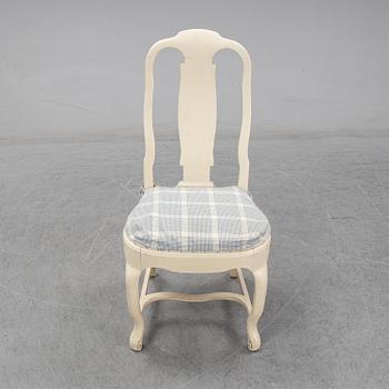 A set of six chairs and a pair of armchairs, rococo style, early 20th century.