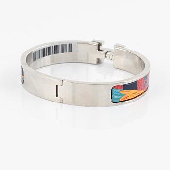 Hermès, a 'Clic H Toucans de Paradis' bracelet.