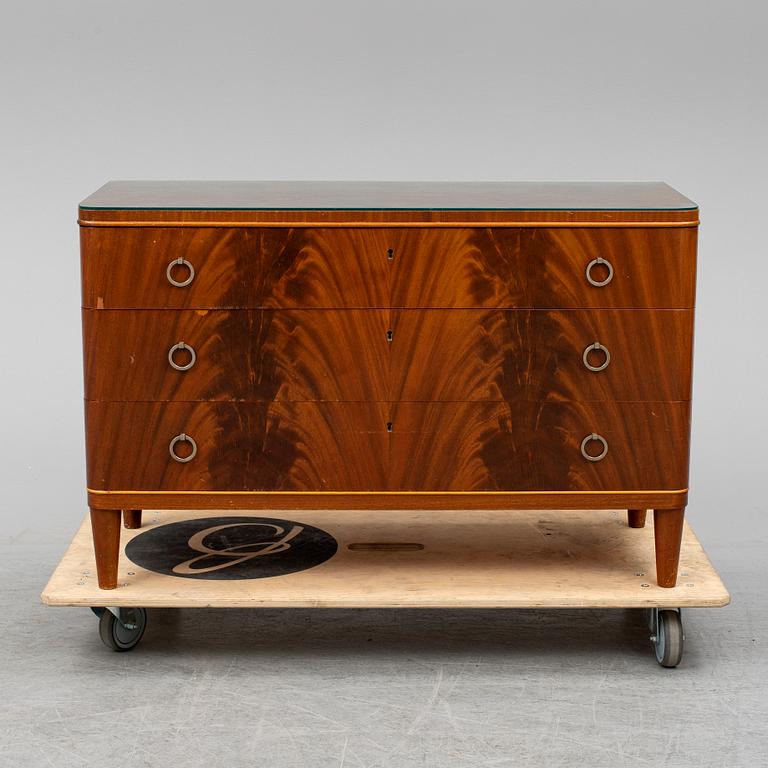 A chest of drawers, mid 20th century.