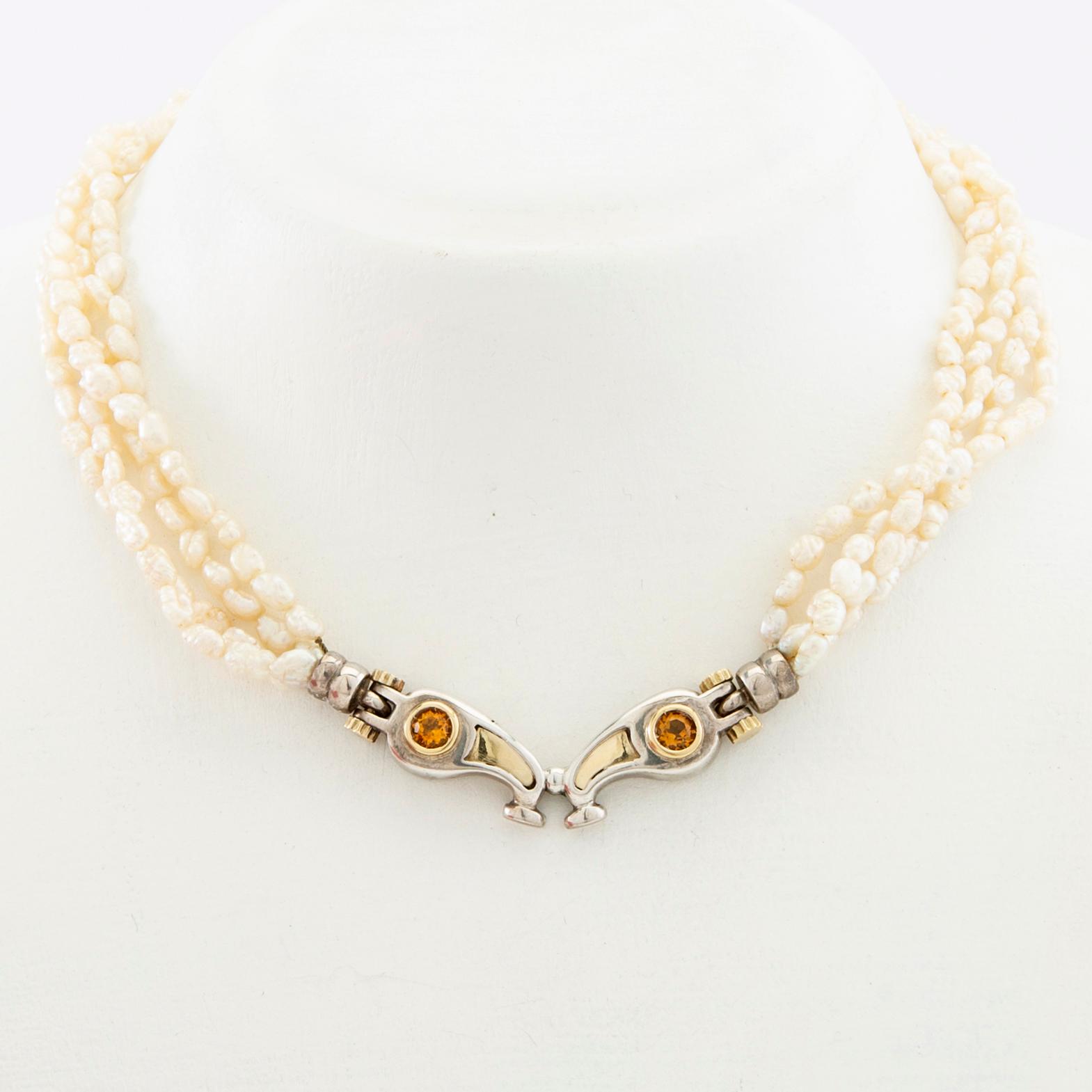 Tonino Lamborghini, Necklace of cultured pearls with a pendant of 18K gold, silver, and faceted citrines.