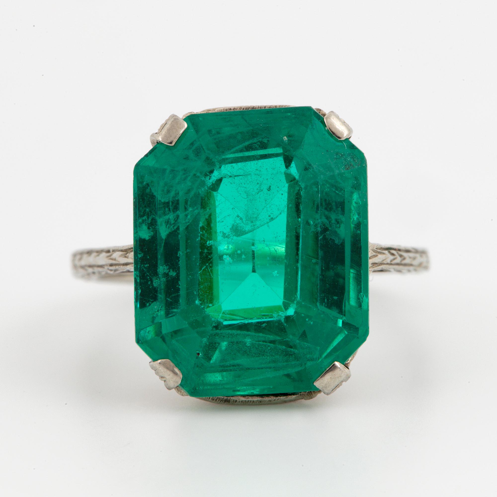 Synthetic emerald cocktail ring.