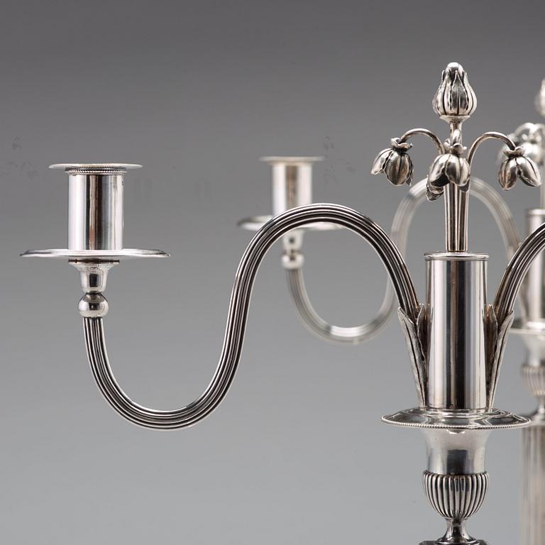 A pair of Swedish 18th century silver candleabra,  mark of Pehr Zethelius, Stockholm 1799.