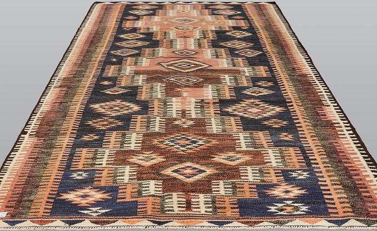 A kurdish kilim carpet, 310 x 190 cm.