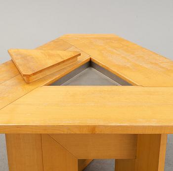 A 1970s ashwood table by Silvio Coppola for Monitna, Italy.