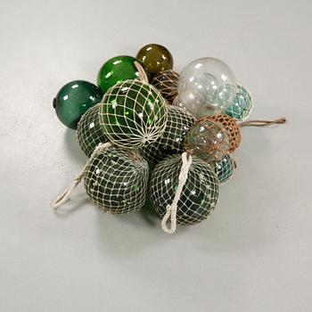 Seventeen glass fishing floats, 20th century.