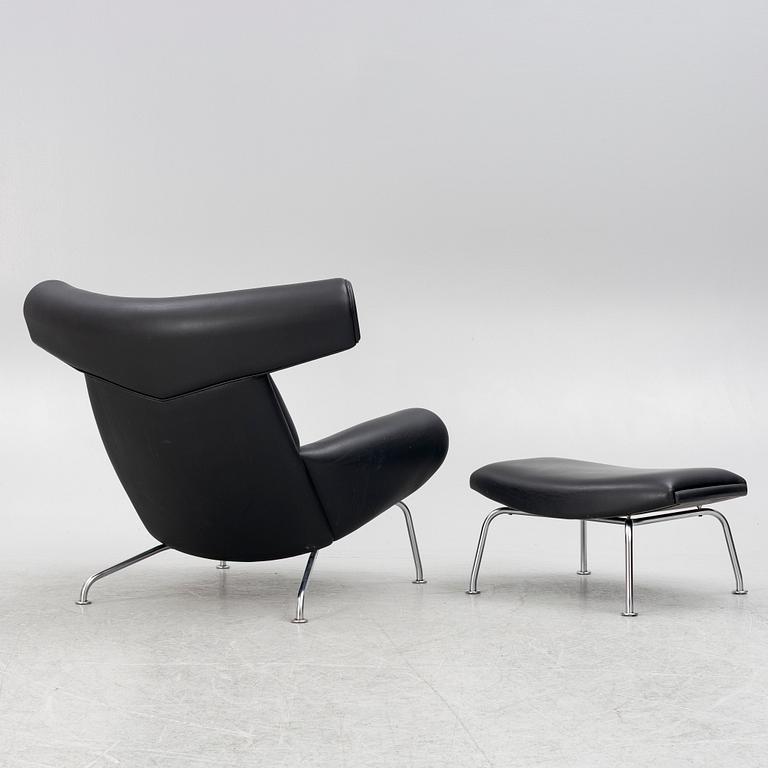Hans J. Wegner, fåtölj med fotpall, "Ox Chair", EJ-100, Erik Jørgensen Møbelfabrik A/S, Svendborg, Danmark.