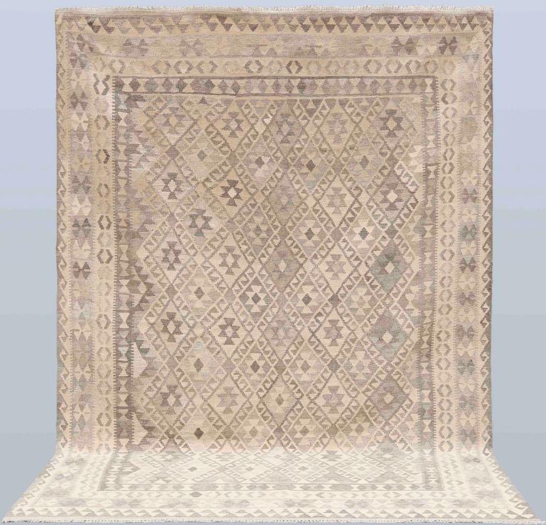 A Kelim carpet, 295 x 210 cm.