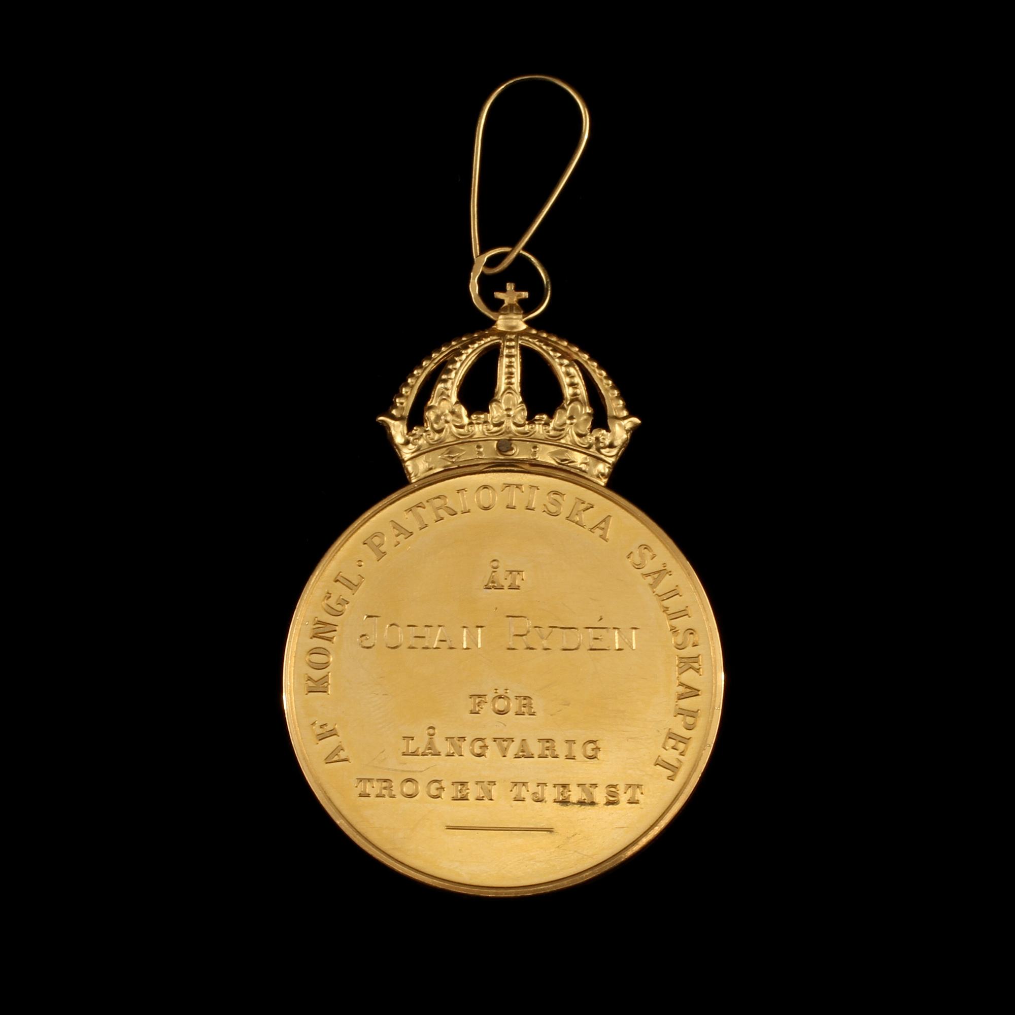 MEDALJ, 18 k guld, 1957. Vikt 33 g.