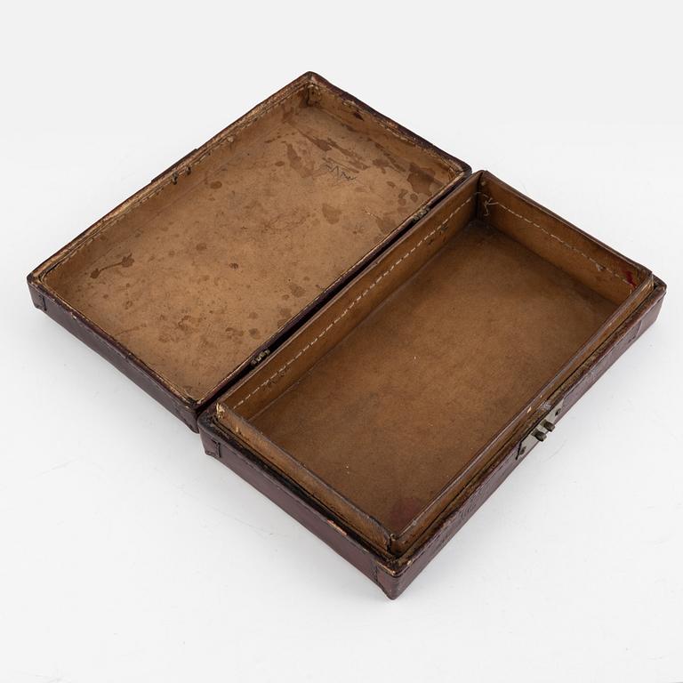 A Chinese leather box, late Qing dynasty.