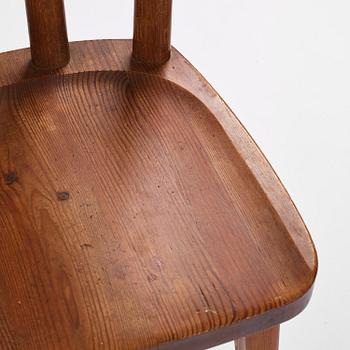 Axel Einar Hjorth, a set of six stained pine "Utö" chairs, Nordiska Kompaniet, Sweden, 1930s.