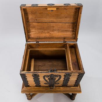 A oak baroque chest on a later leg frame.