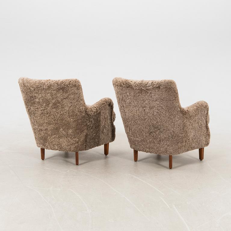 Armchairs, a pair from the 1940s.