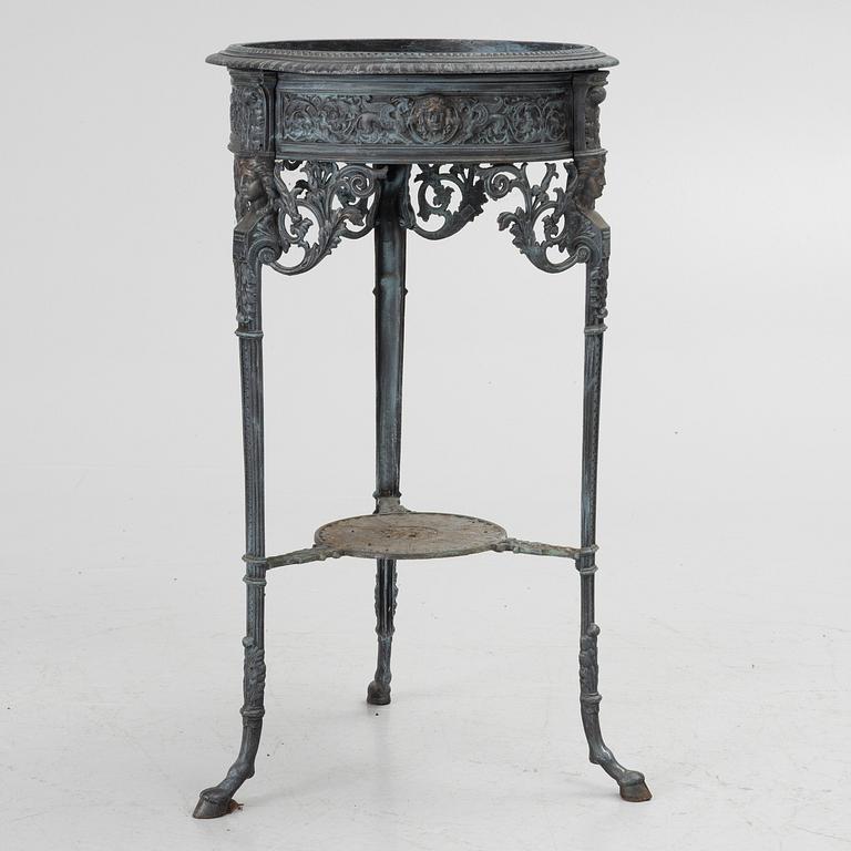 A plant stand, late 20th century.