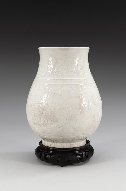 A set of two white glaze bronze shaped vessels, Qing dynasty, Kangxi (1662-1722).