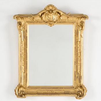 A carved gilt-wood 'Rococo' frame, possibly 18th century.