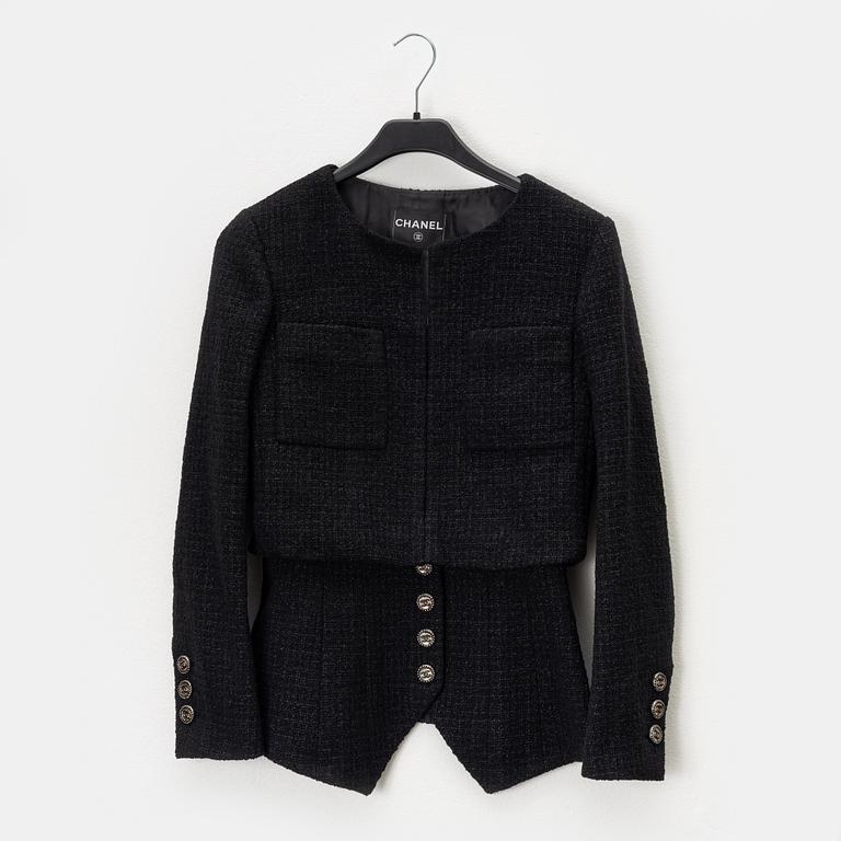 Chanel, A black bouclé jacket, size 34.