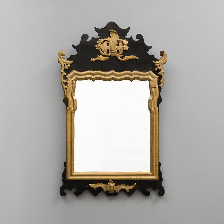An 18th century rococo mirror.