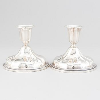 A pair of Norwegian silver candle sticks, mid 20th century.