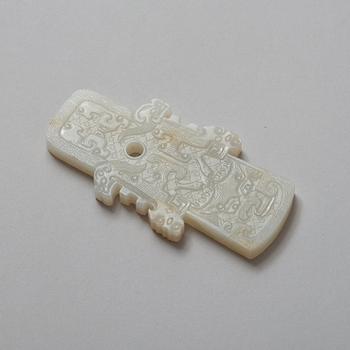 An archaistic nephrite plaque, China.