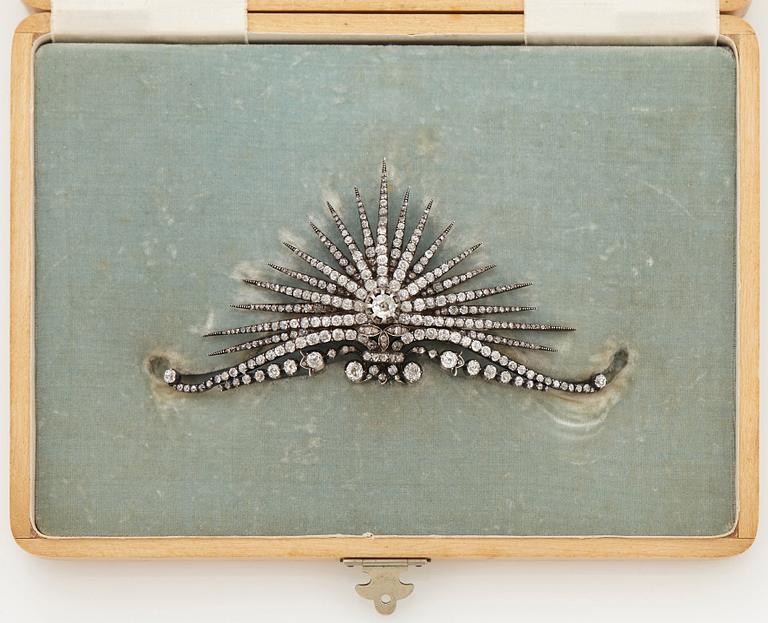 A tiara/brooch in gold and silver set with old- and rose-cut diamonds in a fitted case stamped Fabergé.