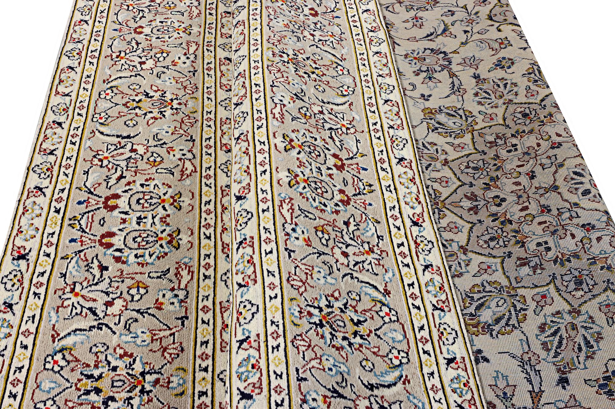 A Kashan carpet, c. 334 x 234 cm.
