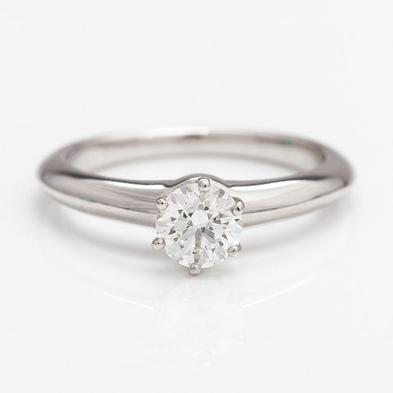 Tiffany & Co, A platinum ring with a ca. 0.55 ct diamond.