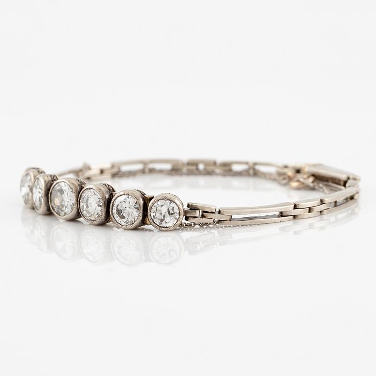 A bracelet in 14K white gold set with old-cut diamonds.