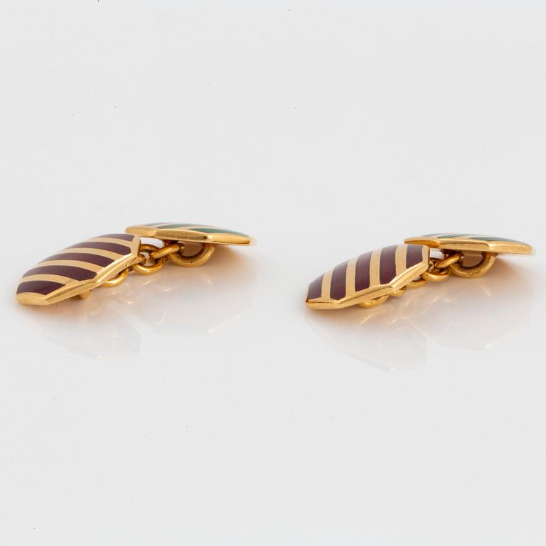 A pair of Tiffany cufflinks in 18K gold with enamel decoration.
