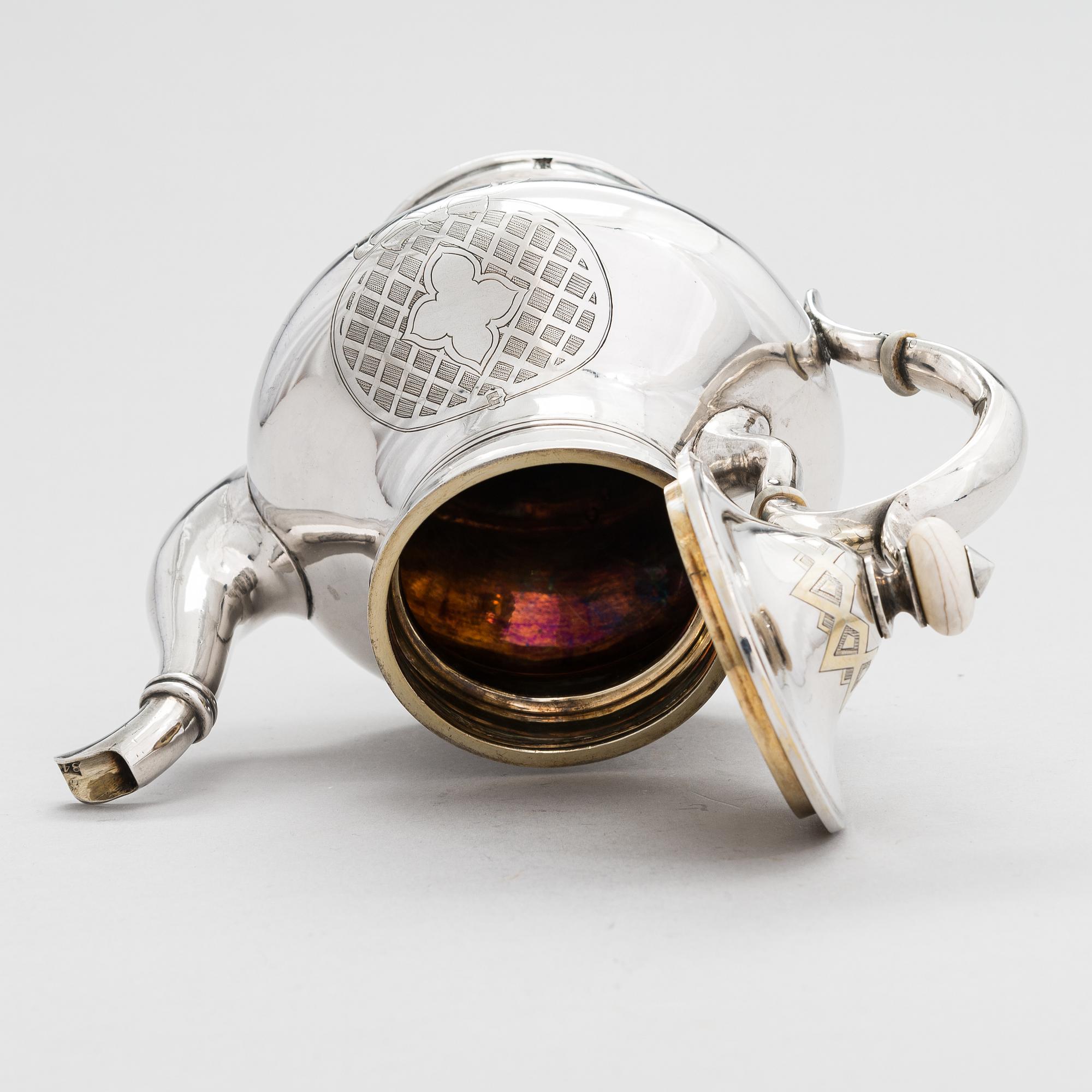 A Russian silver teapot, maker's mark of Andrei Wilgelmovich Wekman, Moscow 1871.