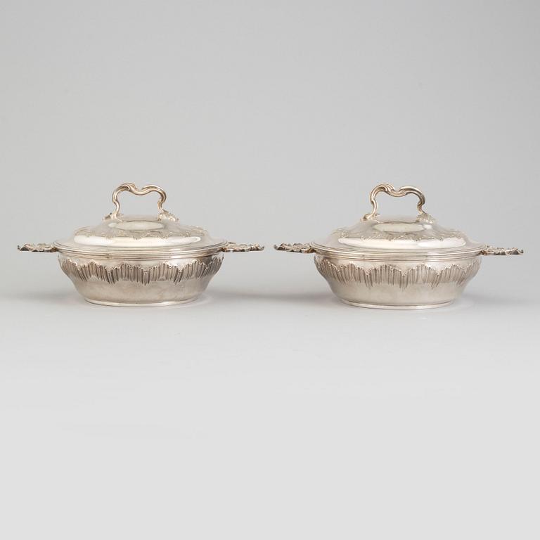 TUREENS, a pair, sterling, silver. Louis XV-style. French export marks after 1879.